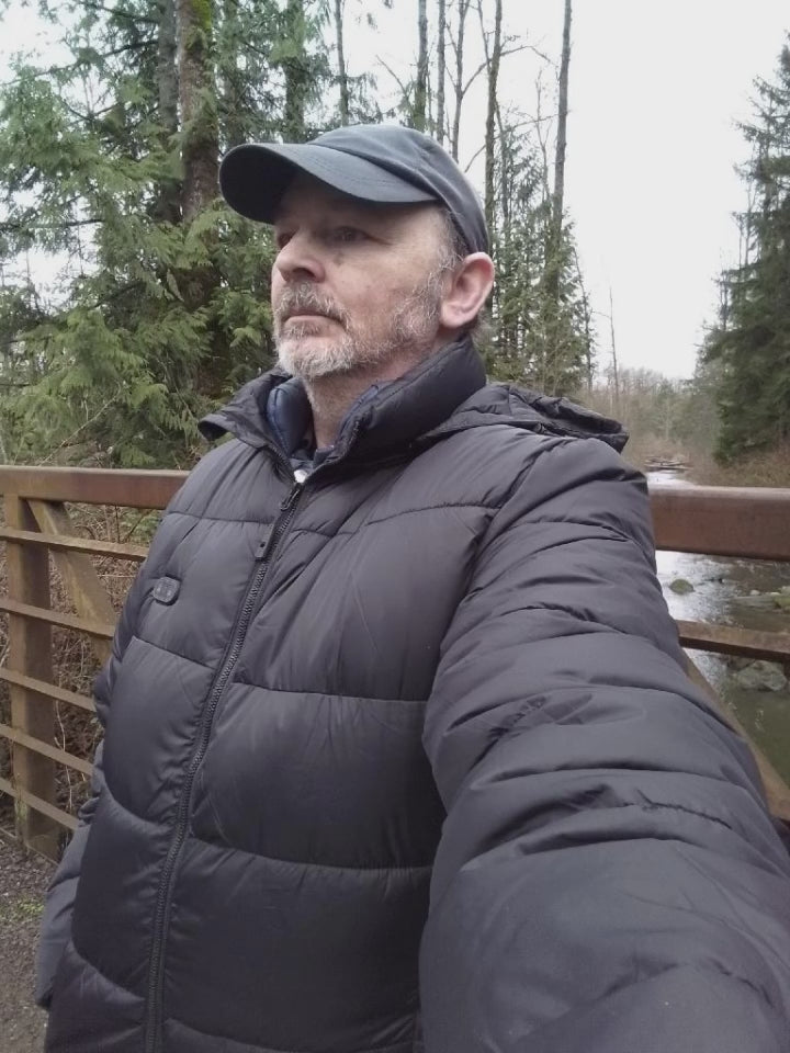 Load video: Tom wearing USB heated jacket...